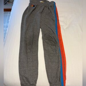 Aviator Natron sweatpants with Blue and Orange Stripes